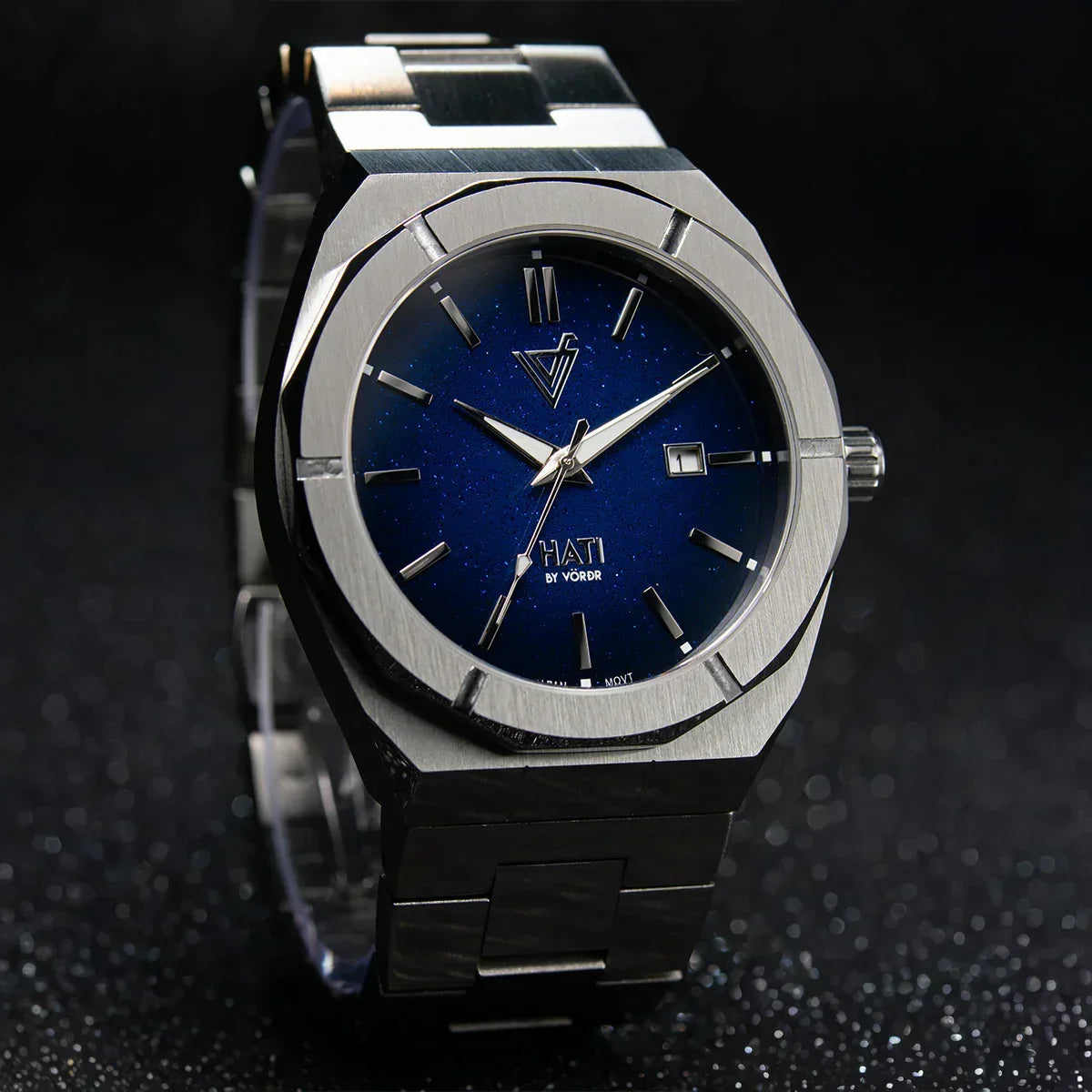 Reloj de pulsera de acero inoxidable con carátula azul, diseño moderno y elegante para hombre.